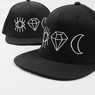 Embroidered Snapback Cap Black and White Embroidered Snapback Cap