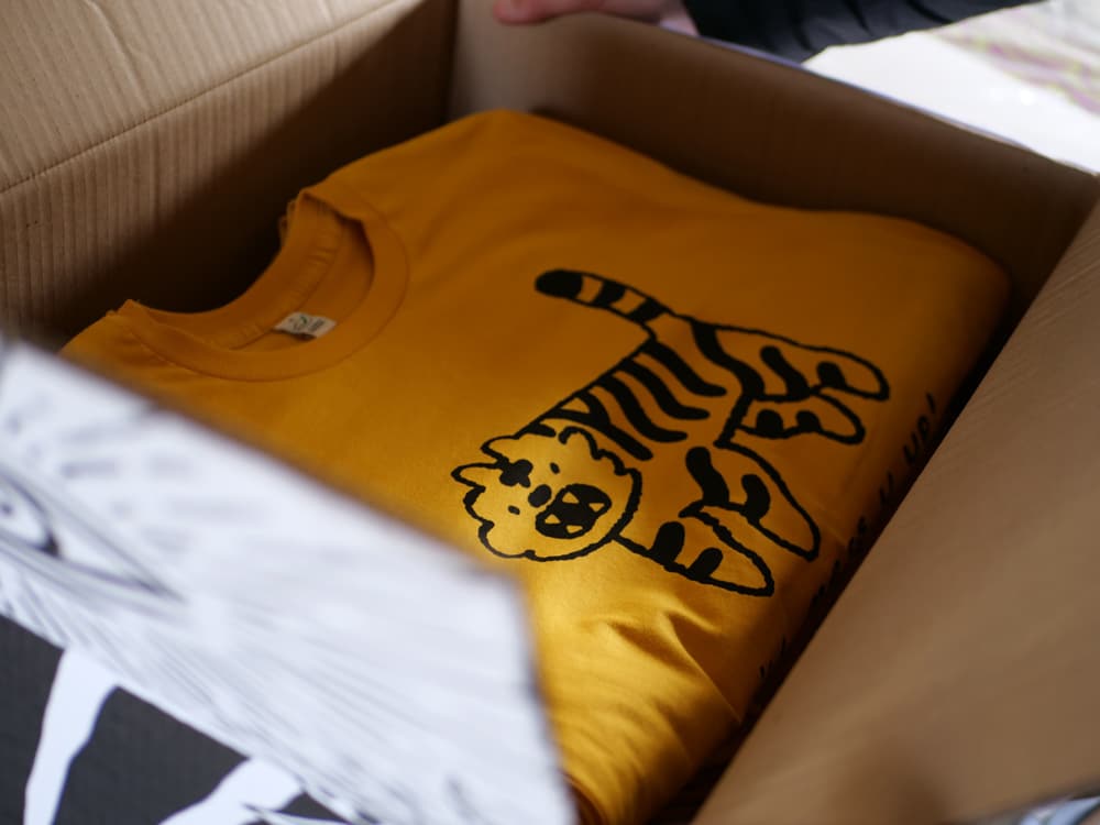 Box of bulk screen printed custom t shirts